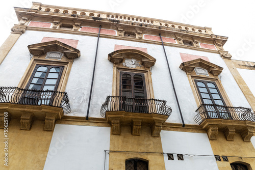 Facade of an old classic building, Palermo, Sicily, Italy