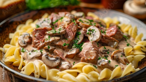 Savory Beef Stroganoff with Mushrooms and Egg Noodles in Rustic Bowl, Authentic Russian Cuisine on Wooden Table