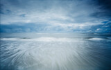 Moody Seascape Photographed with Pinhole on Film. Analogue photo in which sand, sea, waves clouds mix with time.
Long exposure of the North Sea