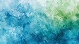 Abstract watercolor background with fluid blue and green tones.