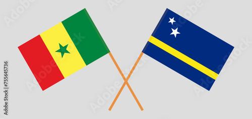 Crossed flags of Senegal and Country of Curacao. Official colors. Correct proportion