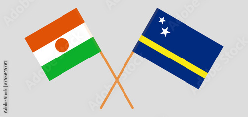 Crossed flags of Niger and Country of Curacao. Official colors. Correct proportion