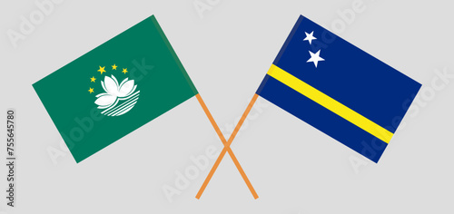 Crossed flags of Macau and Country of Curacao. Official colors. Correct proportion