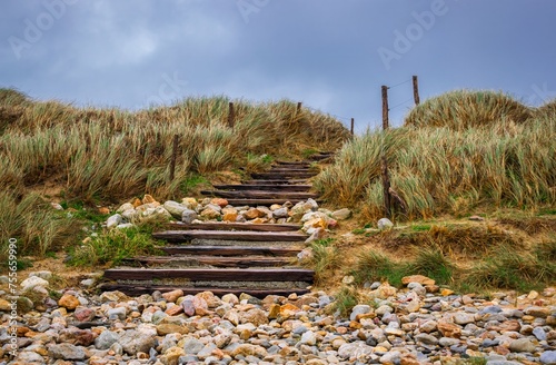 wooden staircase on the beach