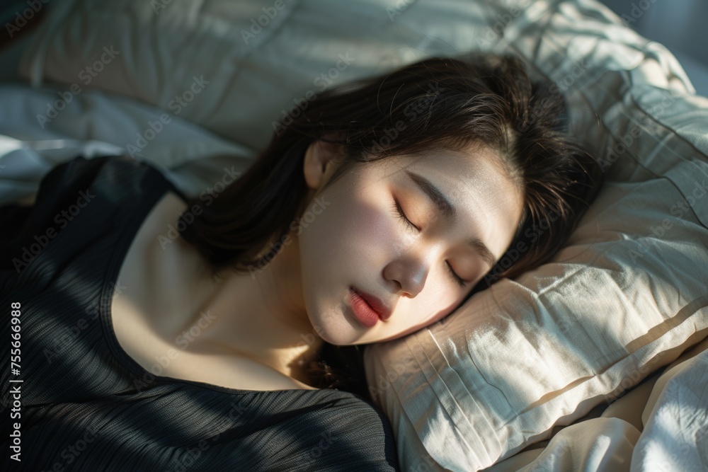 Woman lying in bed sleeping on a pillow, concept of relaxation, rest. Woman lying in bed sleeping on a pillow, concept of relaxation, rest.
