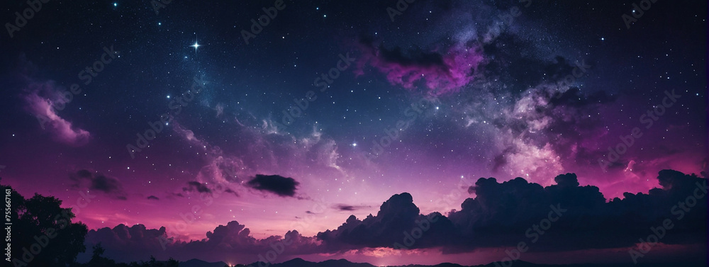 Night Sky Filled With Stars and Clouds