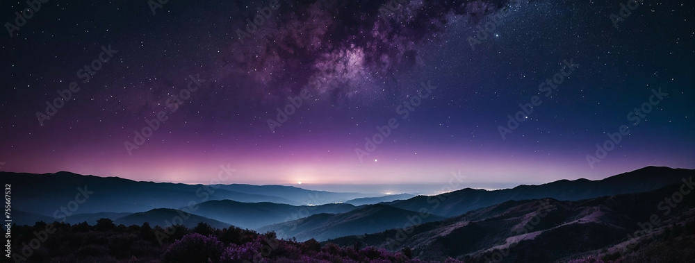 Purple and Blue Sky With Stars Above a Mountain Range