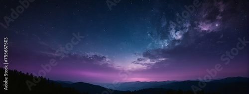 Night Sky With Stars and Clouds Above a Mountain Range © @uniturehd