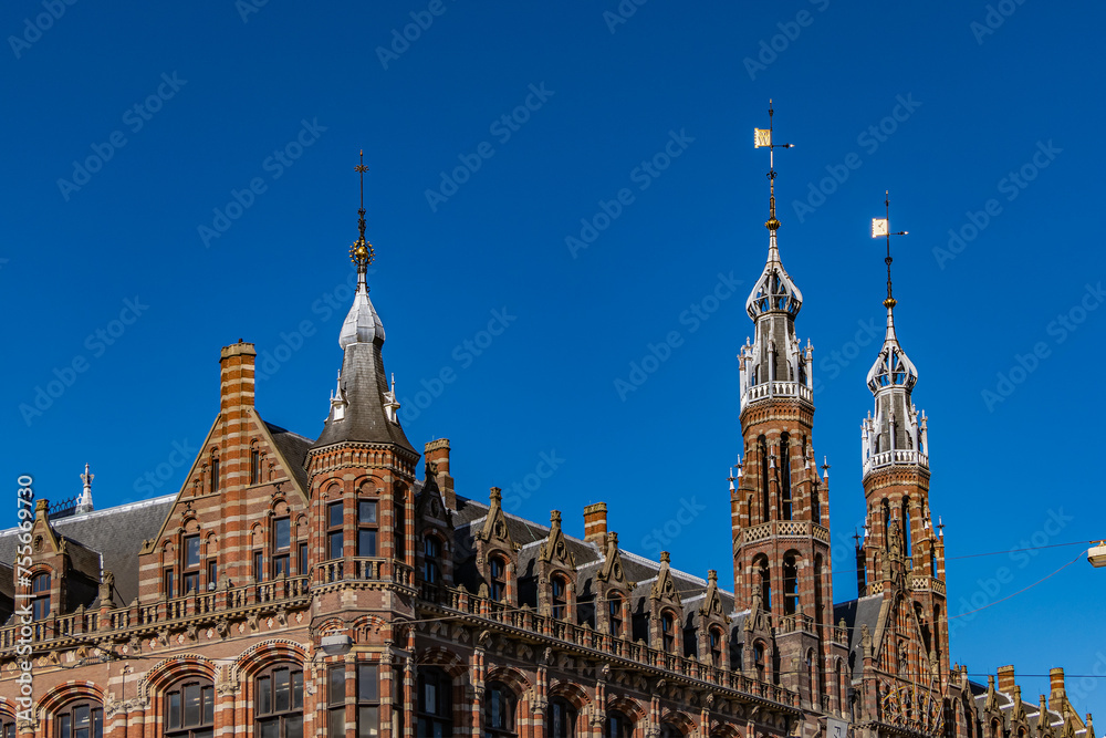 Architectural detail of Neo-Gothic Magna Plaza building (1899). Magna Plaza, formerly known as Amsterdam Main Post Office, is monument part of Dutch Top 100 heritage sites. AMSTERDAM, The NETHERLANDS.
