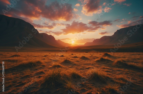 Sun Setting Over Mountains in Desert