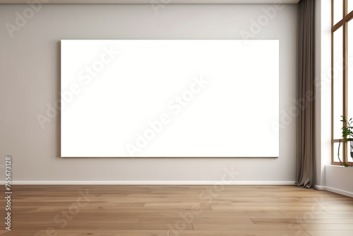 An empty room with a wooden floor and an image on the wall.