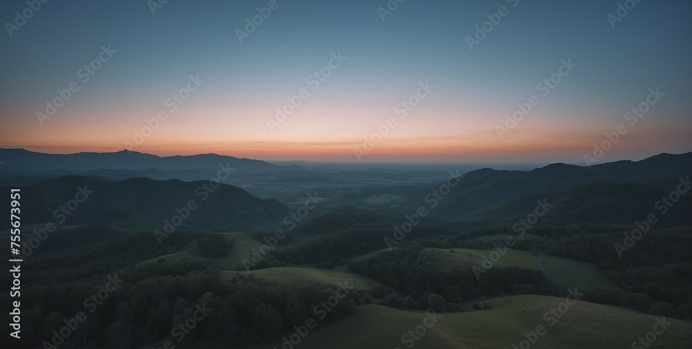 Aerial View of Mountain Range at Sunset