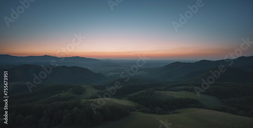 Aerial View of Mountain Range at Sunset