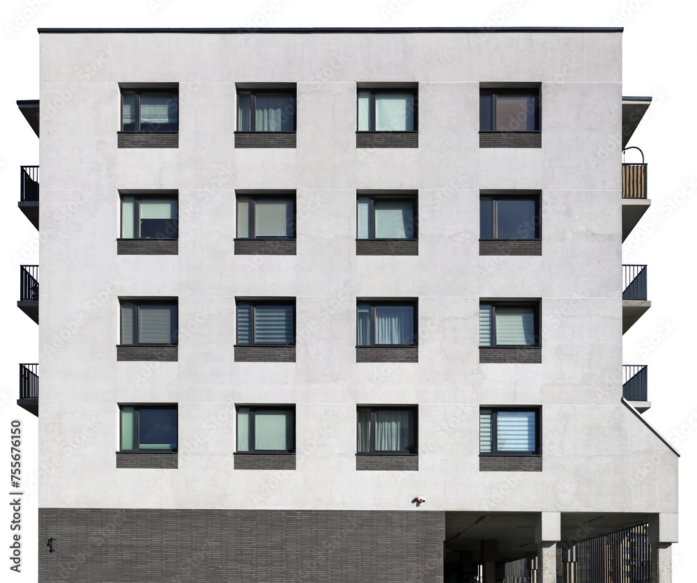 Sixteen windows are located on the side wall of a residential building isolated