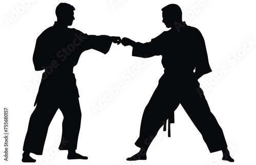 Two men practicing karate silhouette  Two karate men fighters in a match    