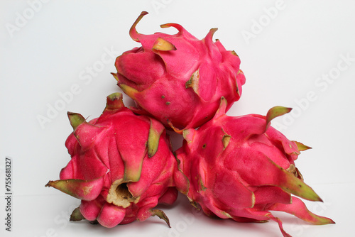 Red pitaya fruits. Three fresh dragon fruit  isolated on white background
