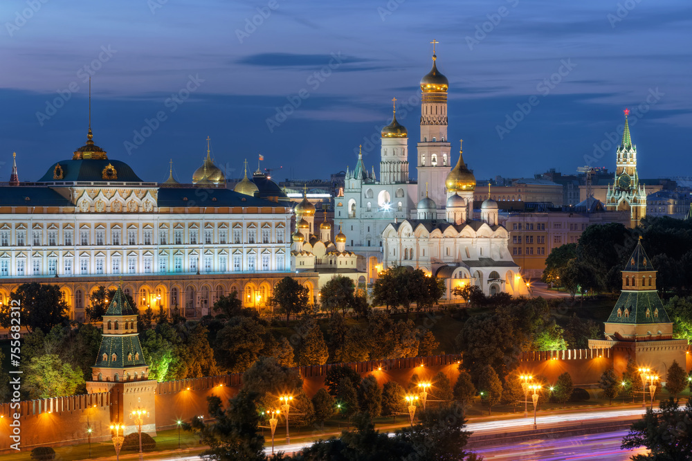 Fototapeta premium Kremlin wall, Ivan Great bell tower and Grand Kremlin Palace at evening in Moscow, Russia