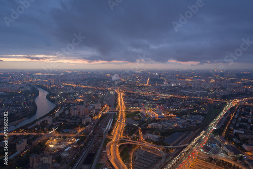Highways, tall buildings, river at evening in Moscow, Russia, panoramic view