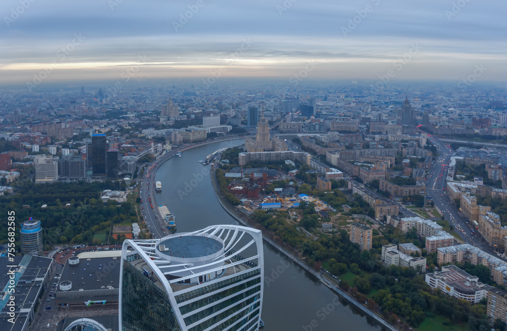 Fototapeta premium Evolution tower, Moscow river, Ukraine hotel in Moscow, Russia at evening