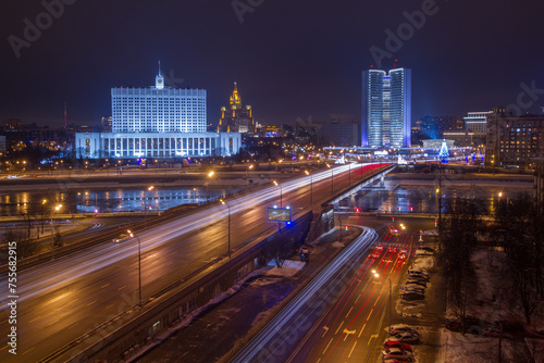 Government of Russian Federation, Novoarbatsky bridge at night in Moscow, this photo on billboard