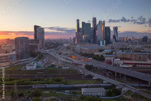 Third transport ring, railway and skyscrapers at evening during sunset in Moscow, Russia