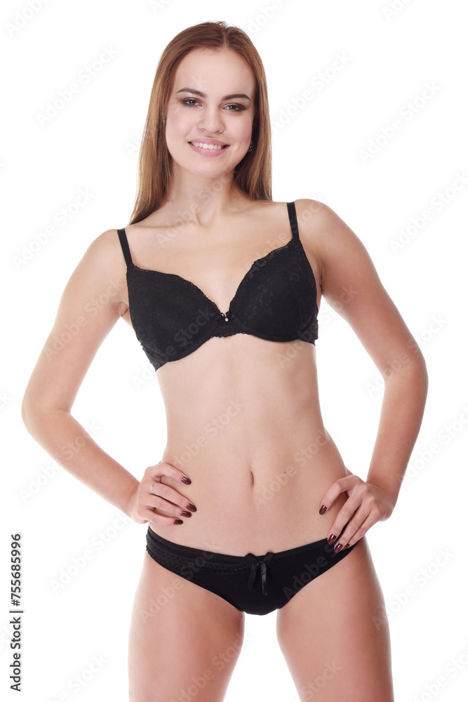 Pretty smiling girl in underwear poses isolated on white background Pretty smiling girl in underwear poses isolated on white background