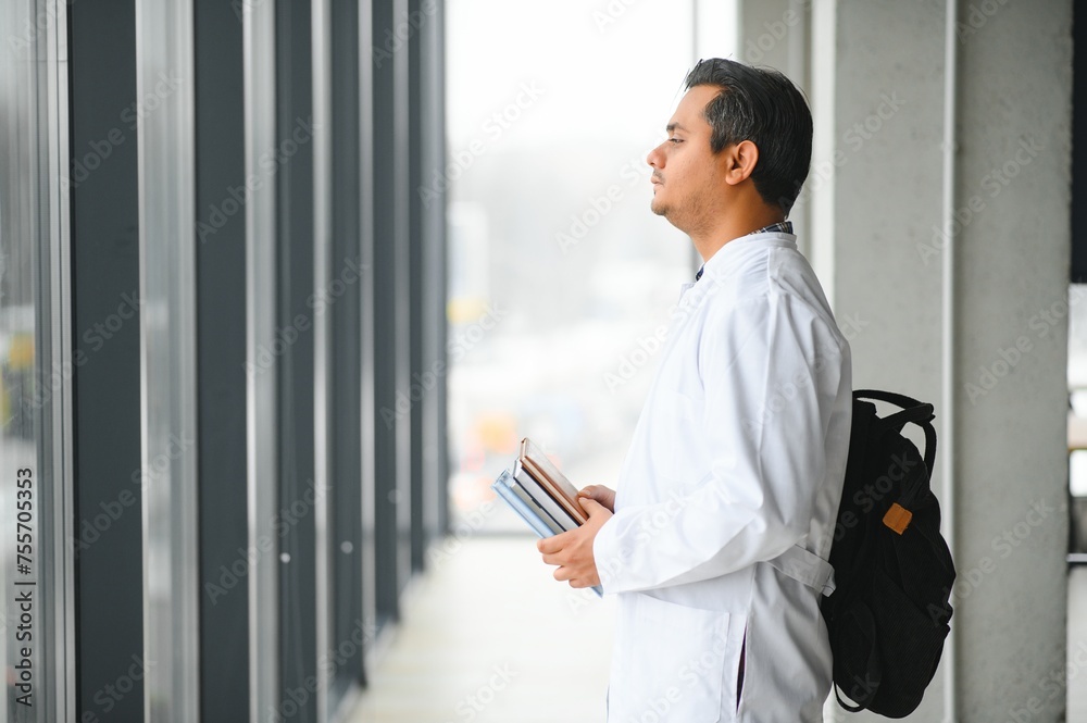 Fototapeta premium Portrait of a young doctor student studying