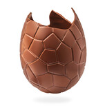 Broken milk chocolate egg on white background. Crushed, Exploded Chocolate Easter egg close up.