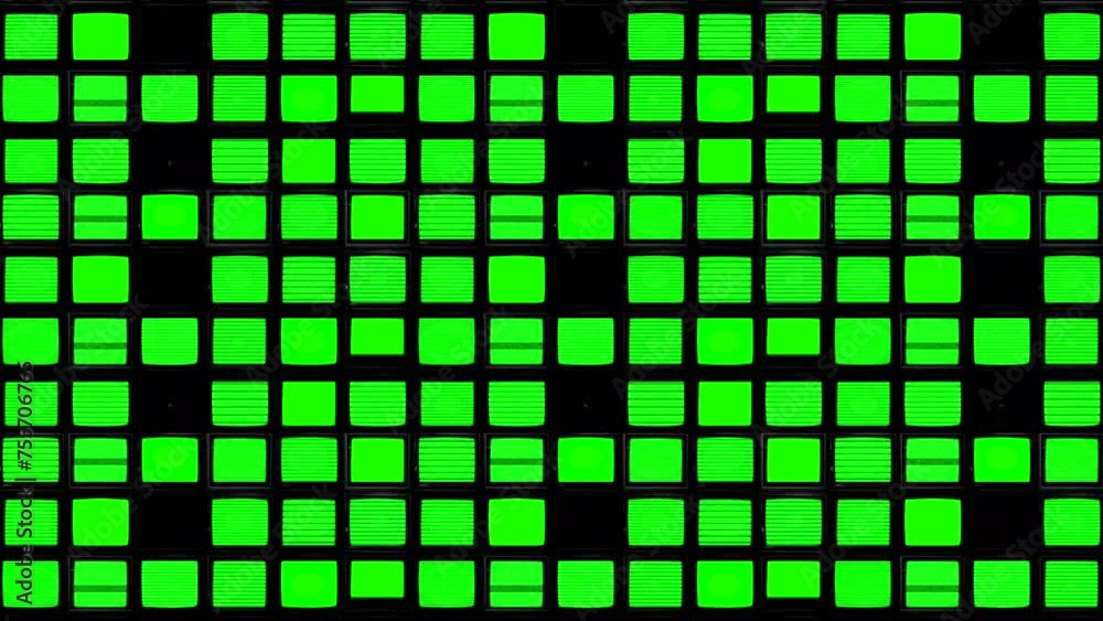 A long shot of a huge wall filled with tv monitor screens in a green screen effect to chroma key out A long shot of a huge wall filled with tv monitor screens in a green screen effect to chroma key out