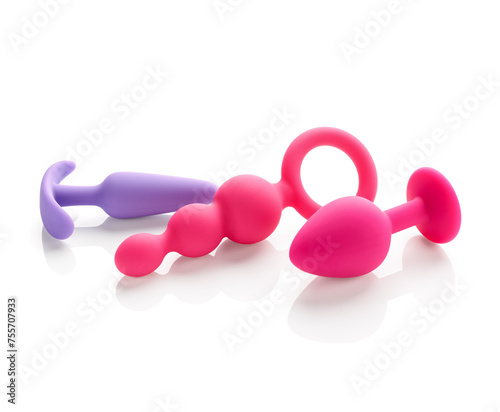 anal plugs in different shades of pink isolated on white background
