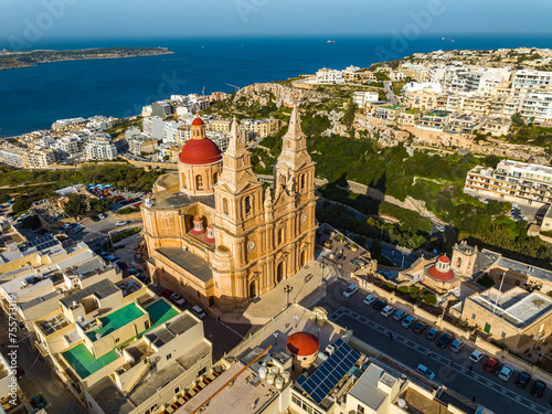 Drone view of The Parish Church in Mellieha. Blue sky, sea, day. Malta 