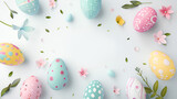 Light blue pastel Easter background with 3d Easter eggs in pastel blue and pink colors on a studio blue background with space for text