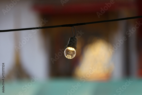 Wallpaper Mural A light bulb hanging on the railing. Torontodigital.ca