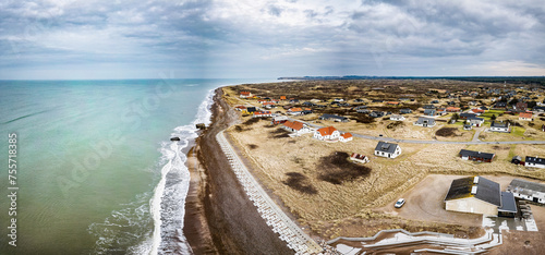 Lild strand beach seen from above with fishing vessel, Denmark photo