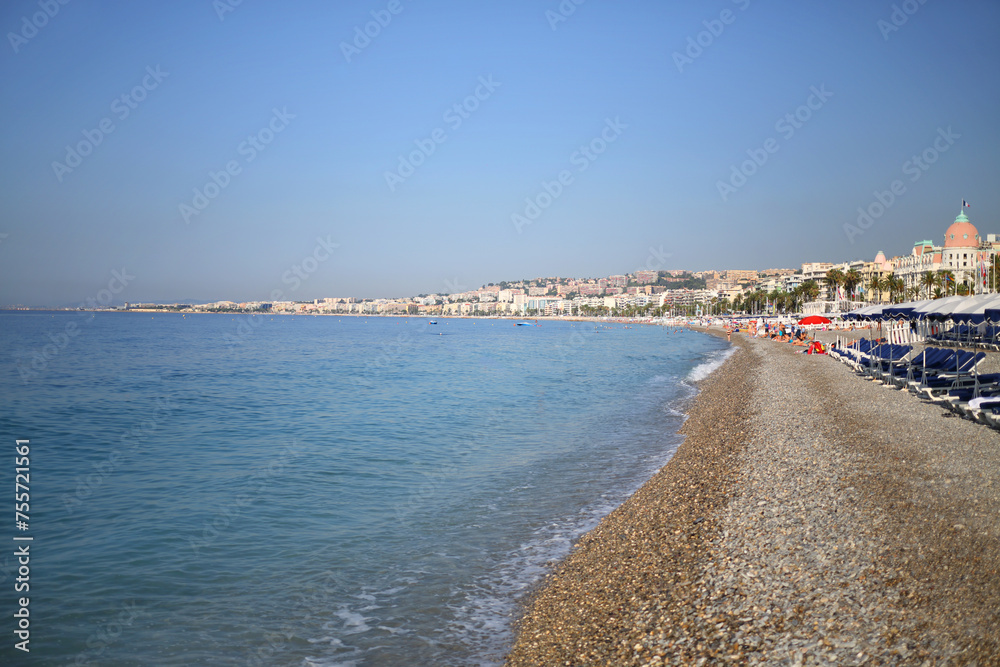 Beautiful beach and blue sea in Cannes, France at summer sunny day