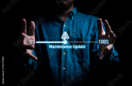 Businessman showing update progress status with exclamation caution warning sign for software development and program update after virus computer attack concept.