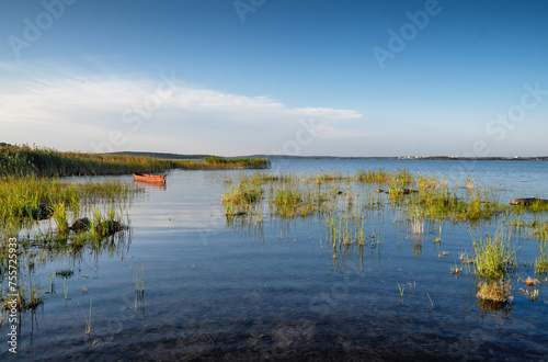 The Middle Urals, a fishing boat on Lake Chebarkul. photo