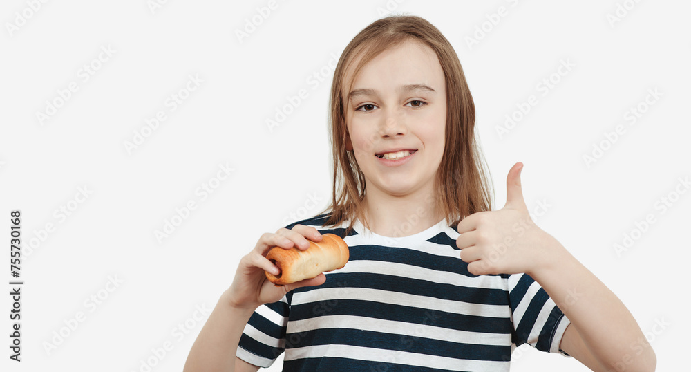 Happy boy holding tasty bun with sausage. Hungry boy eating snack. Happy boy holding tasty bun with sausage. Hungry boy eating snack.