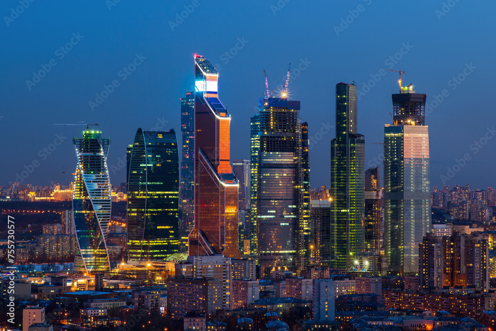 Naklejka premium Cityscape of skyscrapers of Moscow City business complex. Moscow City include area of business activity, which will bring together business, apartment