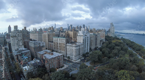 Residential houses near crossroad of Riverside Drive with West 79th street at summer evening. Aerial view