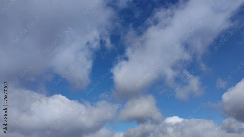 Curious landscape of clouds of different shapes at noon Curious landscape of clouds of different shapes at noon