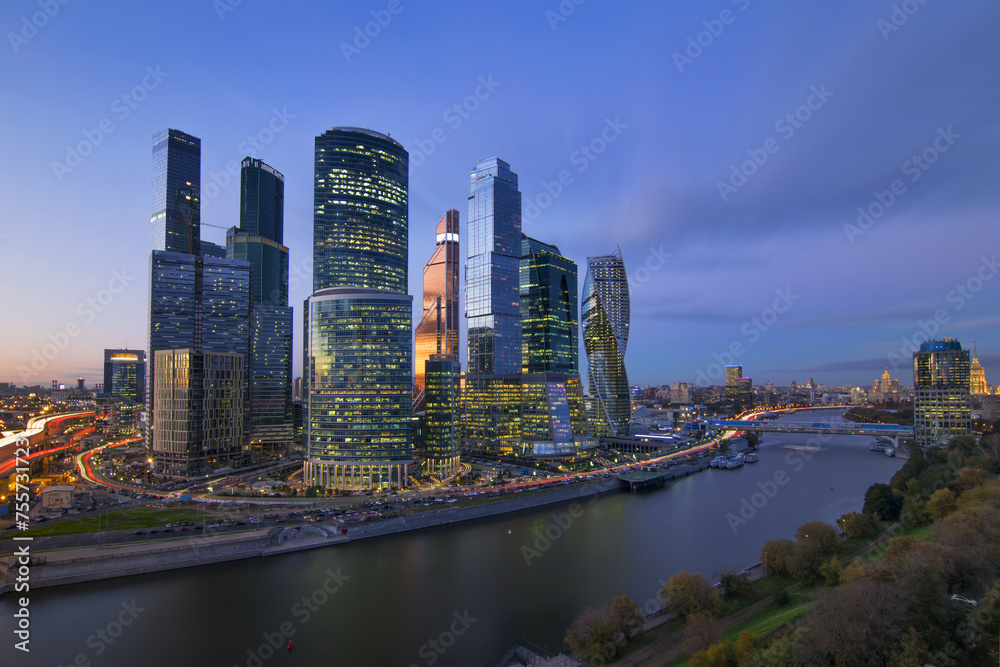  Cityscape of skyscrapers of Moscow City business complex and river. Moscow International Business Center Moscow City includes 20 futuristic buildings