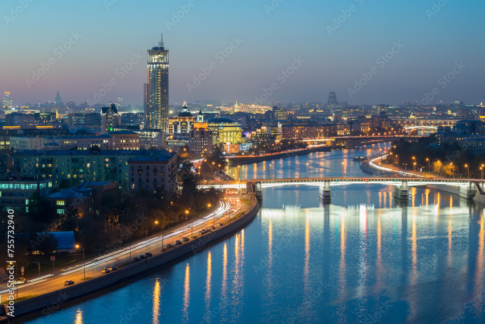 Gateway Bridge, drainage channel and evening panorama of Moscow