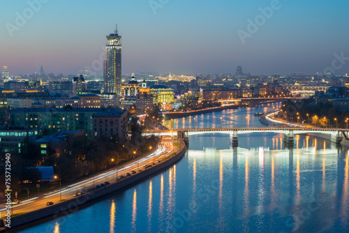 Gateway Bridge  drainage channel and evening panorama of Moscow