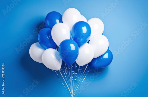 Background with blue, white and light blue balloons with copy-space on a blue minimalist background