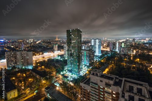 Zvenigorodskoe highway, residential district with illumiantion in Moscow, Russia at night