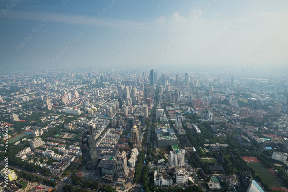Reisdenital area, office buildings in fog in Nanking, view from Zifeng Tower, China