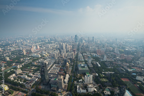 Reisdenital area, office buildings in fog in Nanking, view from Zifeng Tower, China © Pavel Losevsky