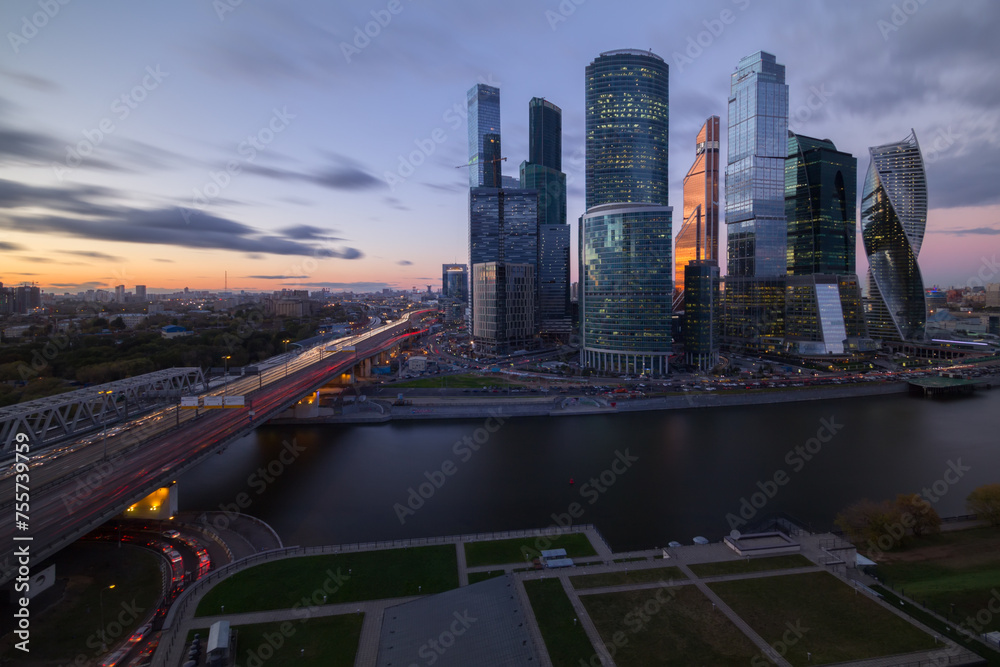 Obraz premium Skyscrapers of Moscow City business complex at evening. Moscow International Business Center Moscow City includes 20 futuristic buildings