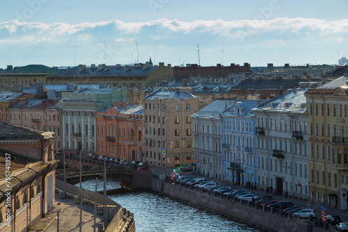 Moyka River embankment, bridge, old residential buildings in St. Petersburg, Russia